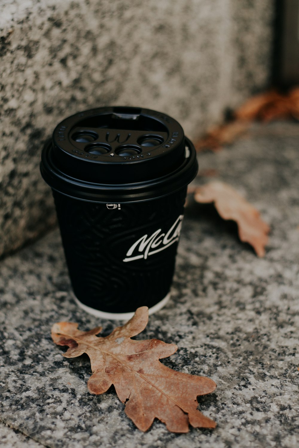 black and white Mccafe disposable cup
