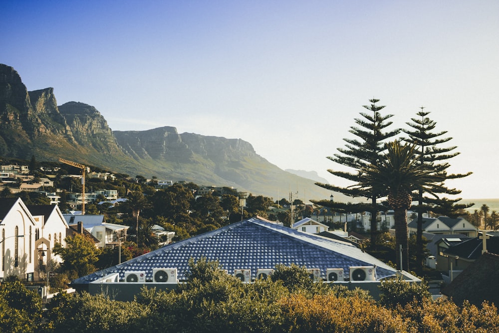 houses near mountain during daytime