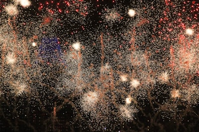 fireworks at night-time sparkling teams background