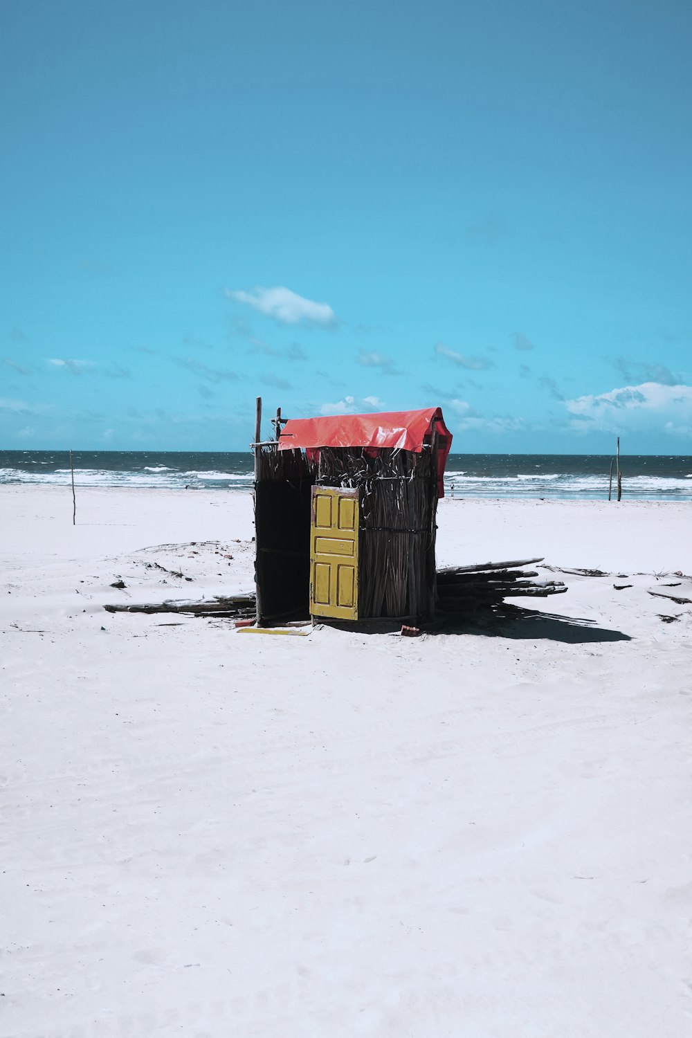 brown wooden shed on ice