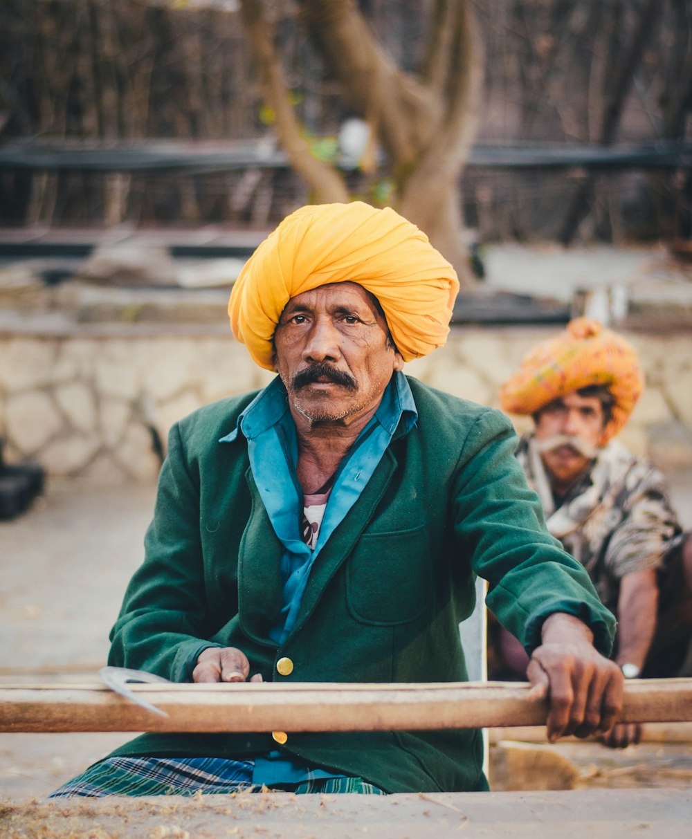 man wearing yellow turban