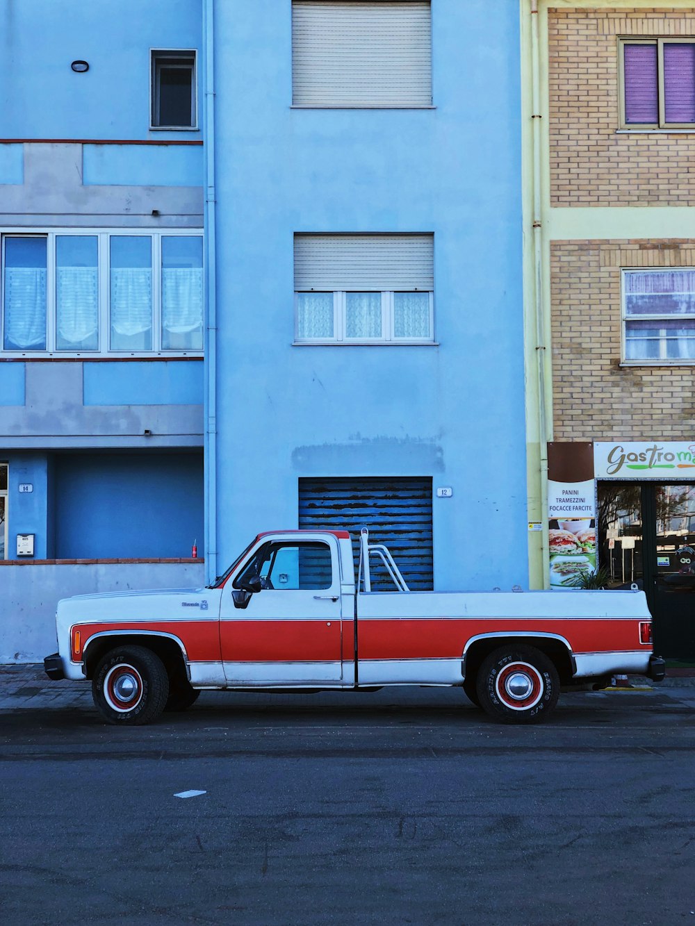 white and red single cab truck