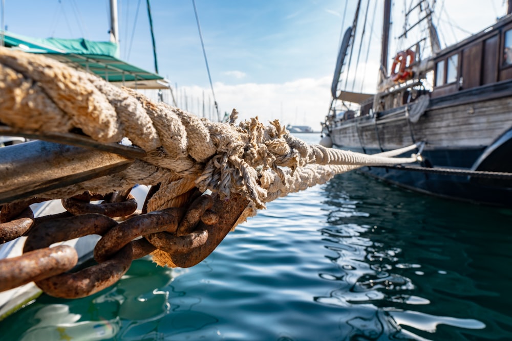 rope mounted on boat on water
