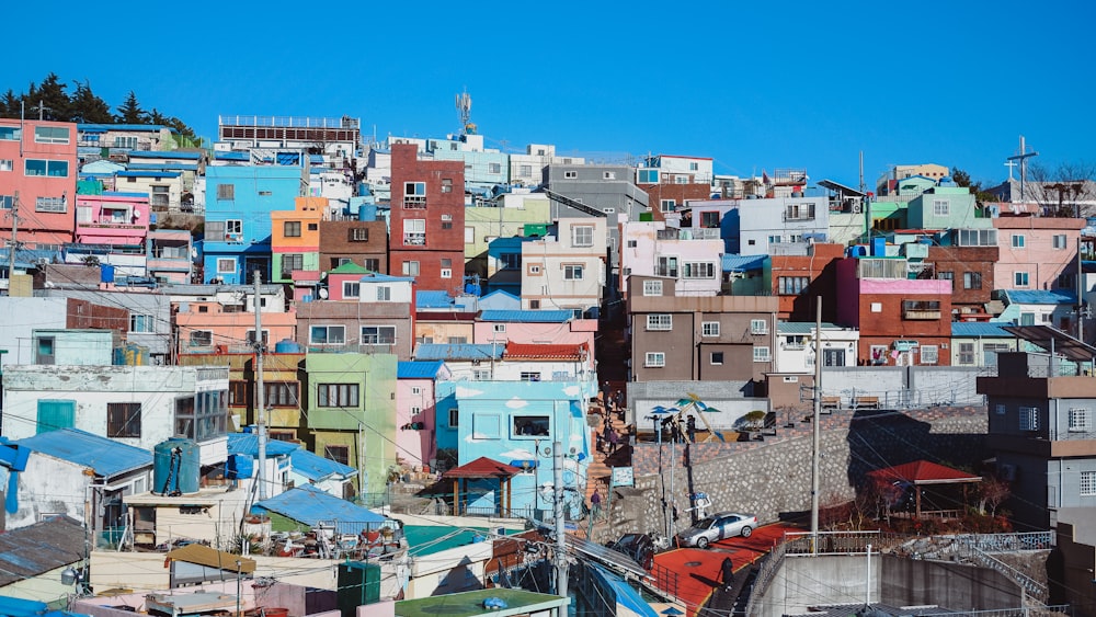 assorted-color houses during day time