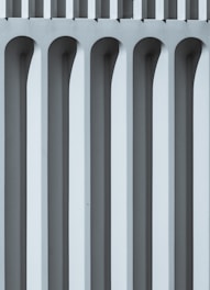 Abstract geometric architectural pattern in deep navy tones symbolizing structure and precision.