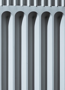 Abstract geometric architectural pattern in deep navy tones symbolizing structure and precision.