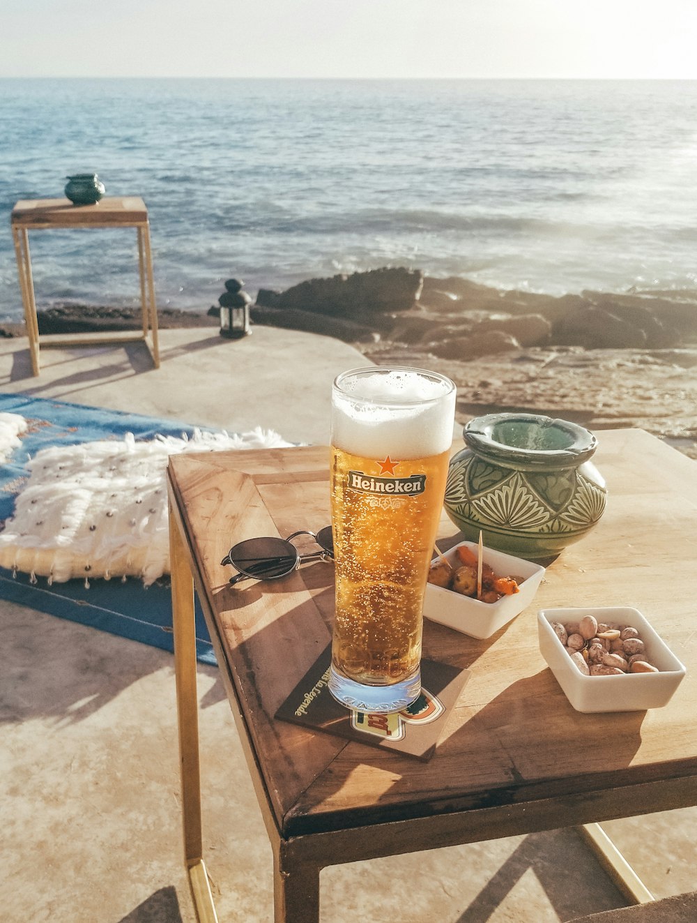 Download Clear Heineken Glass Filled With Yellow Liquid On Wooden Table Photo Free Image On Unsplash PSD Mockup Templates