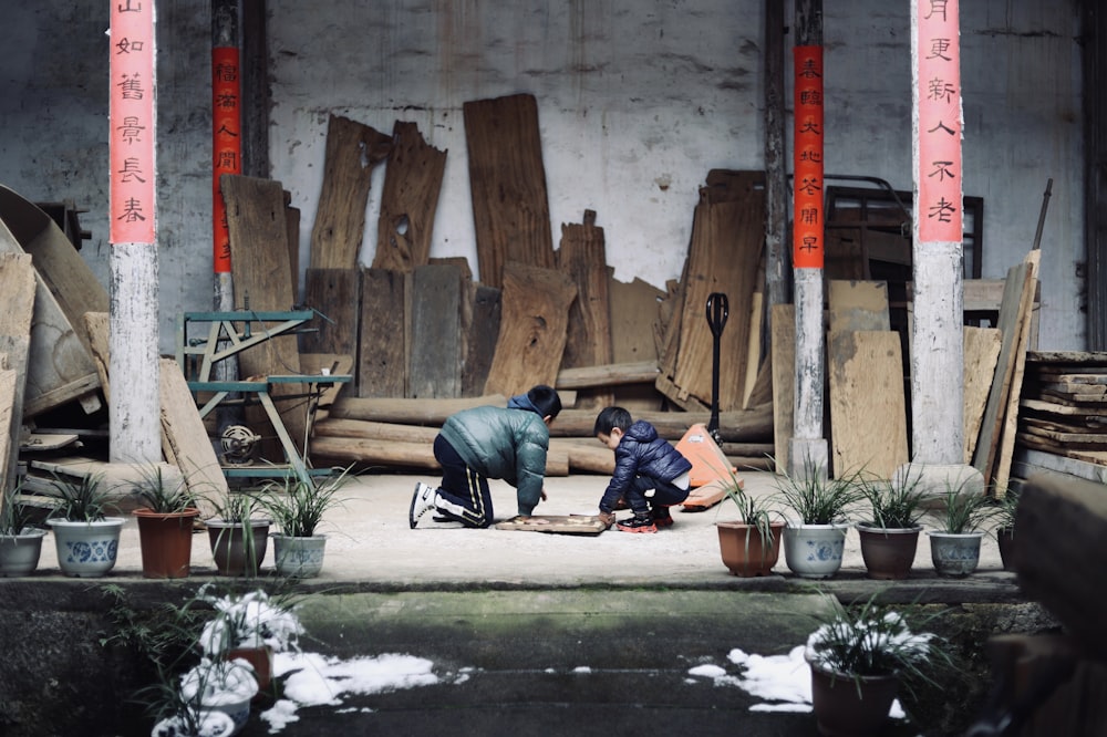 two children playing on floor