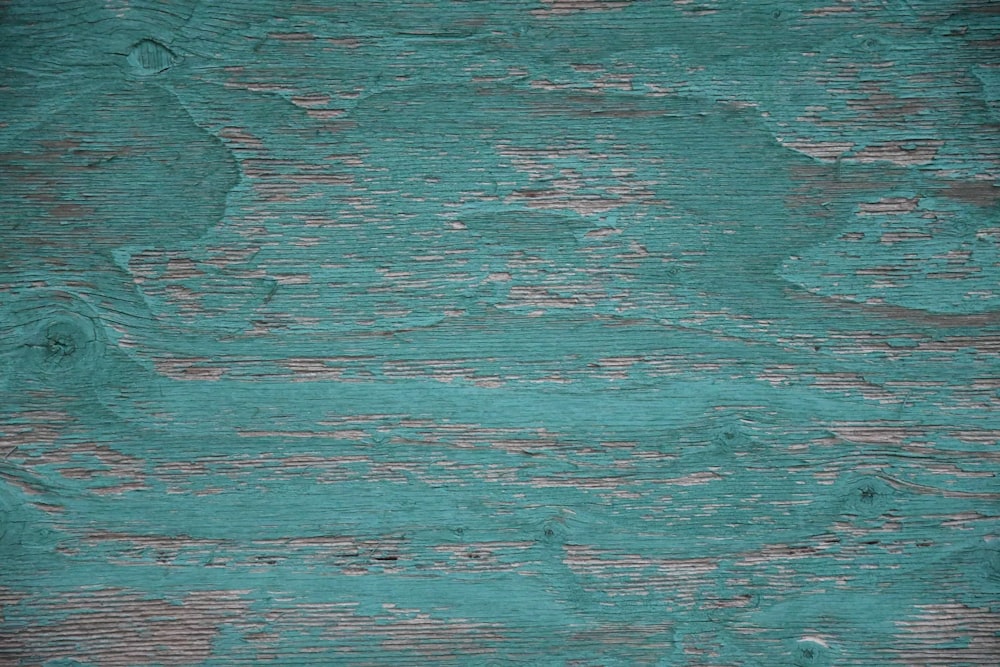 a close up of a green wood texture