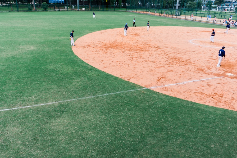 group of people playing baseball