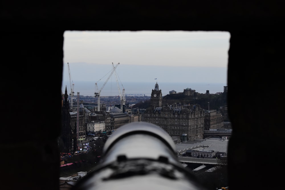 window overlooking buildings beside road