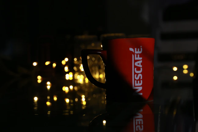 Close-up of a custom printed mug with a vibrant family logo.