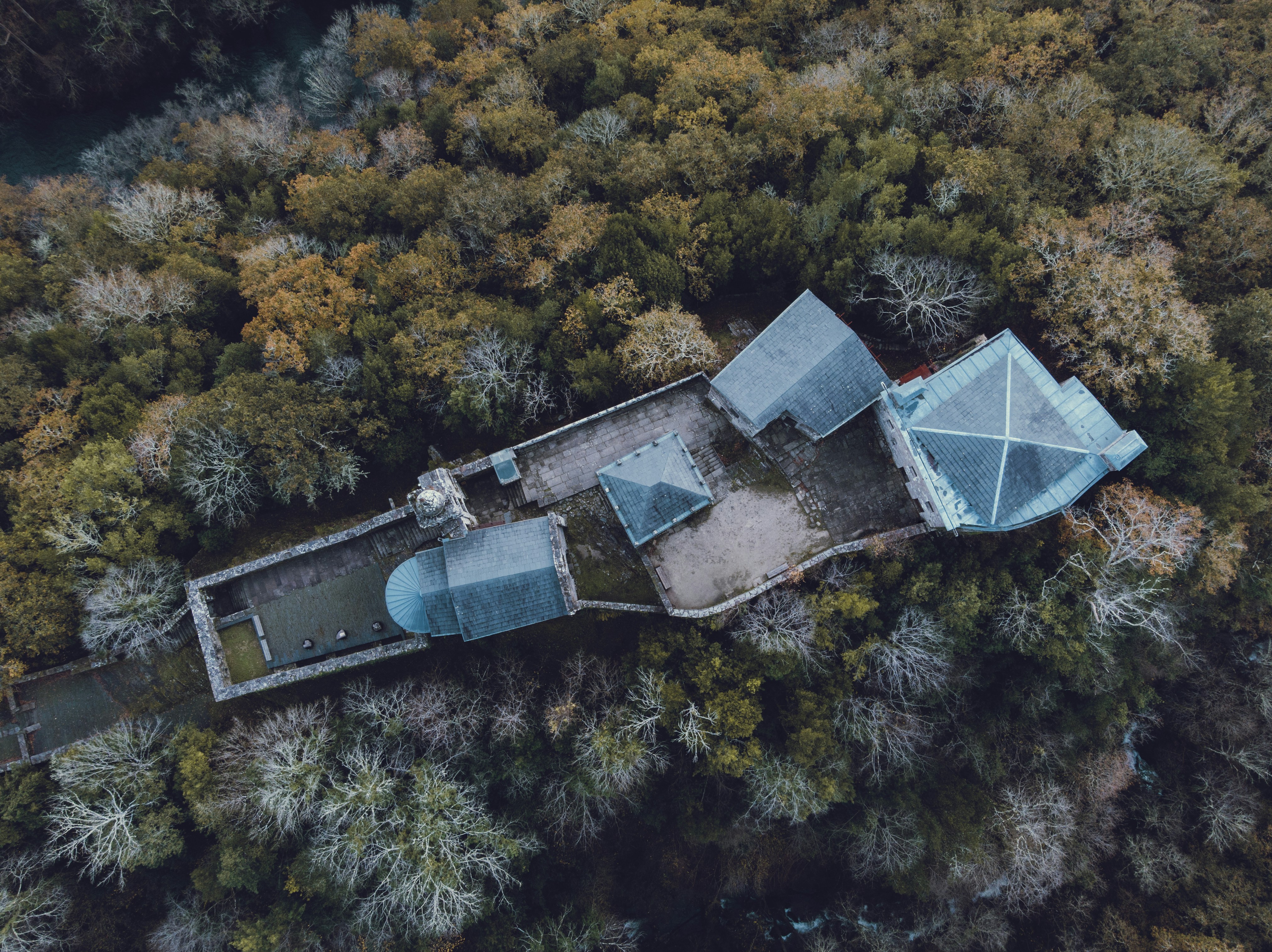 aerial view of trees and building - A Coruña
