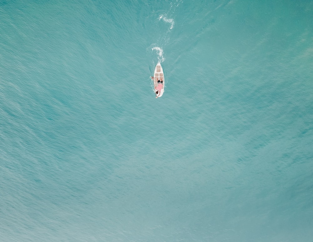 aerial photography of person on paddle board