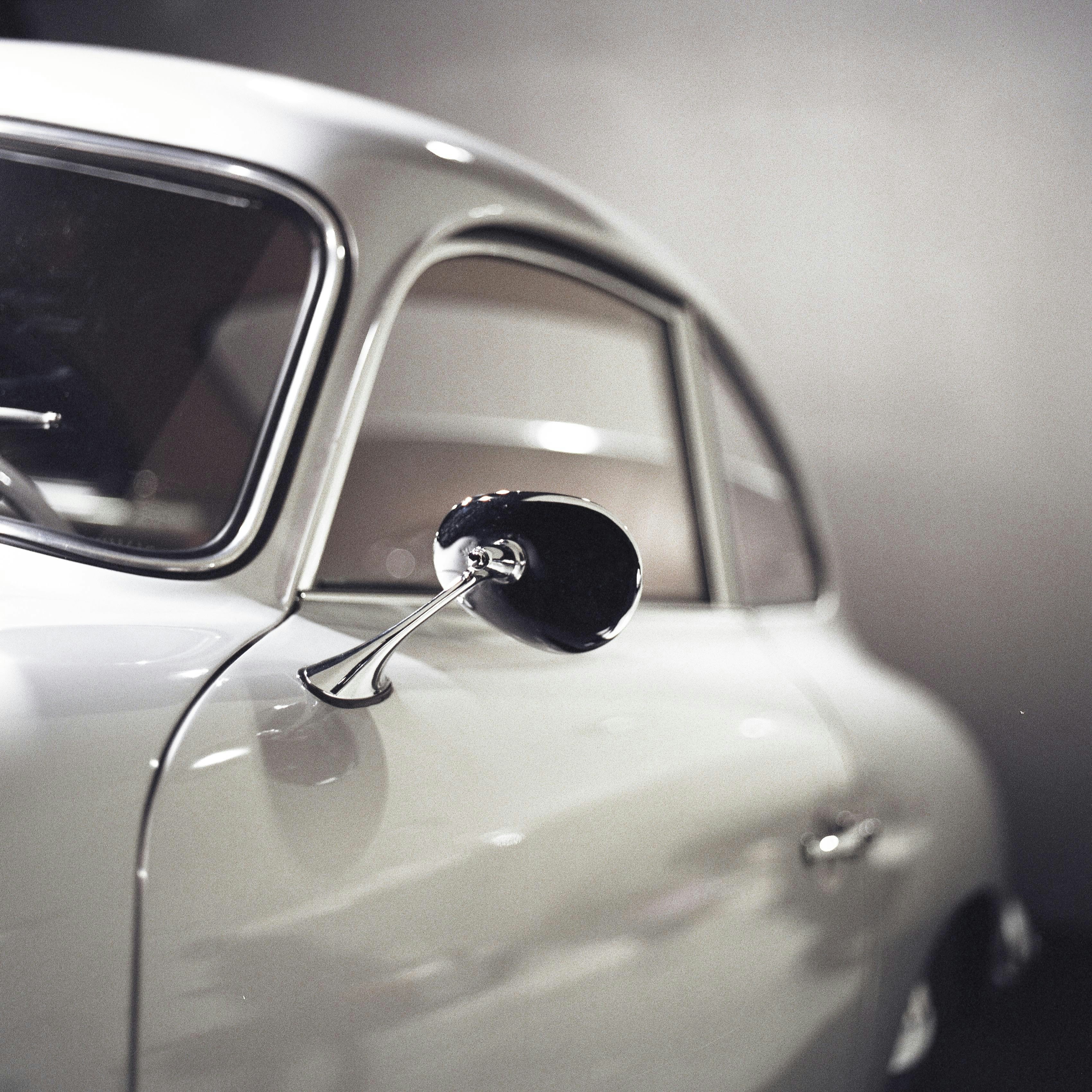 close-up photo of white 3-door hatchback