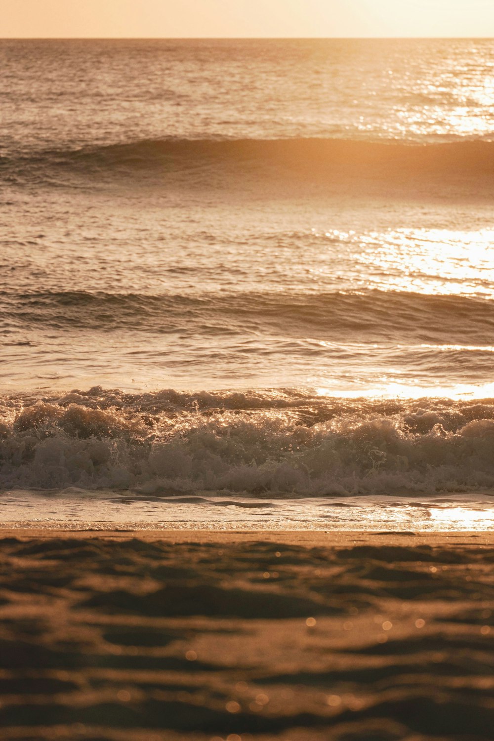 ocean waves during golden hour