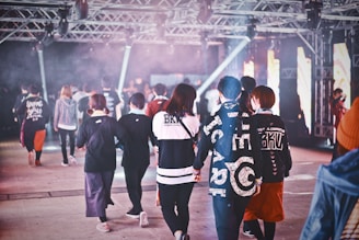 group of people walking inside the building
