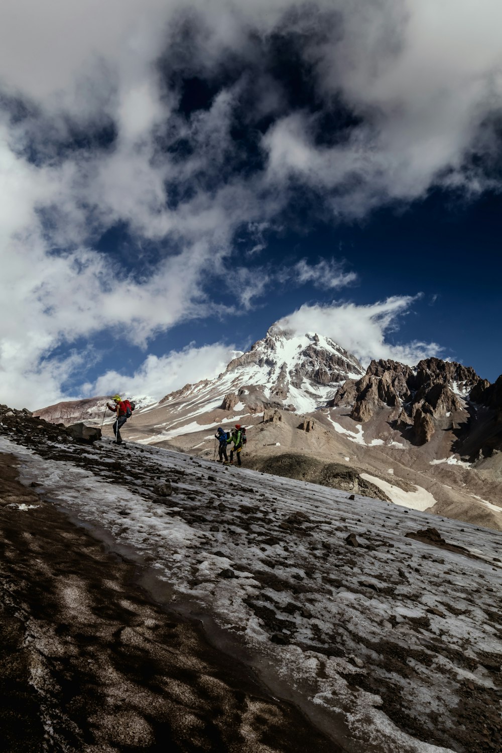 three people climbing on the table