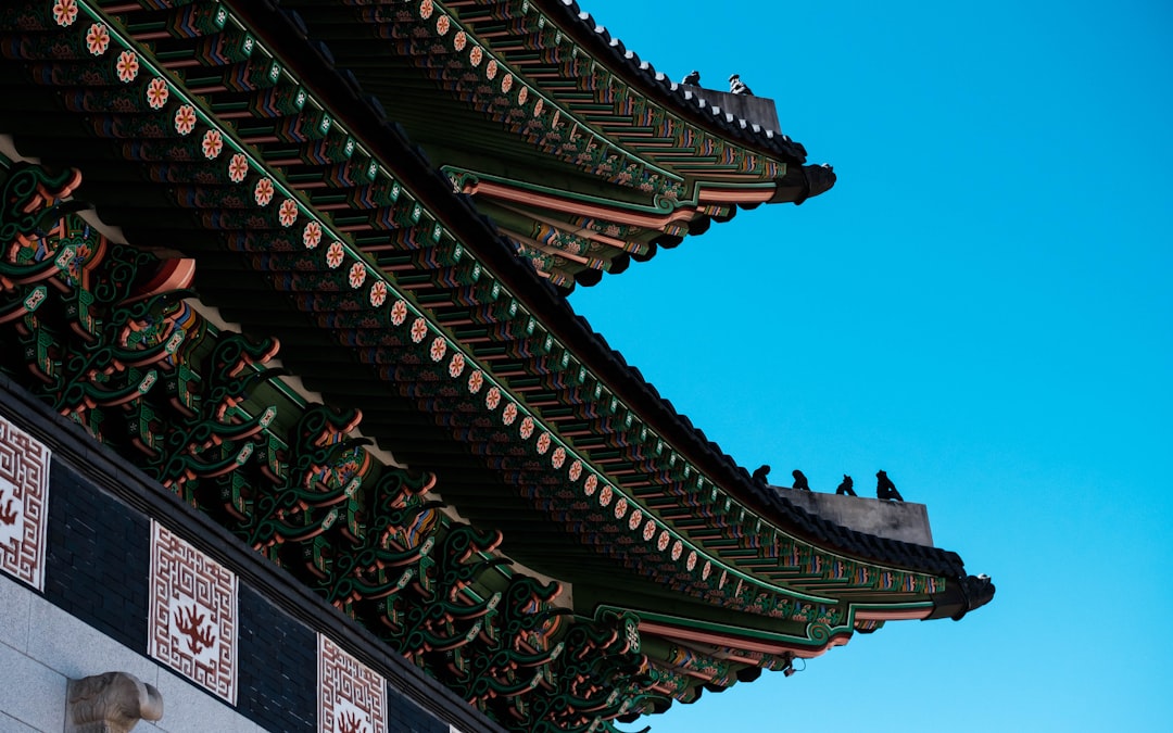 brown temple under blue sky,