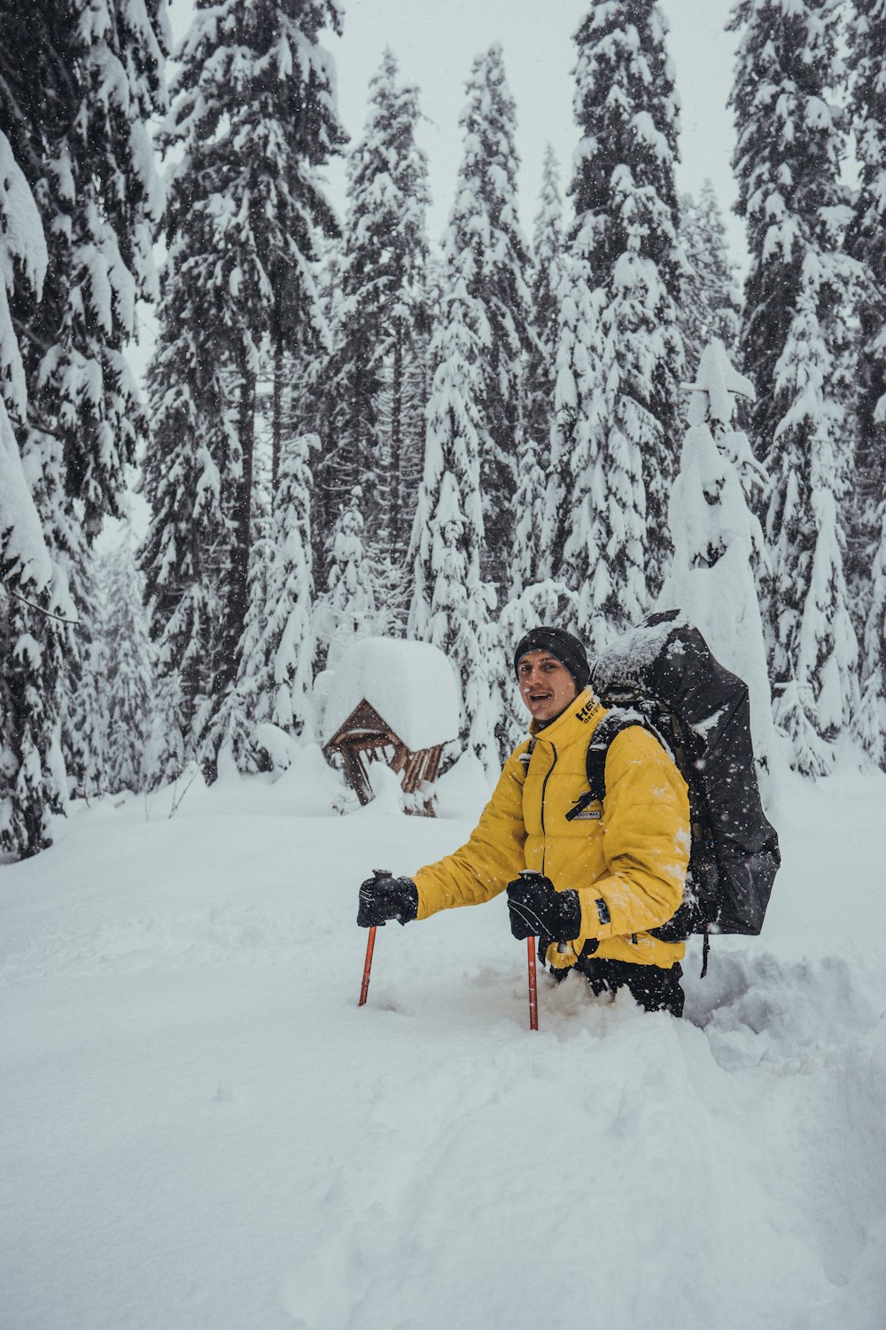 man walking on snow field