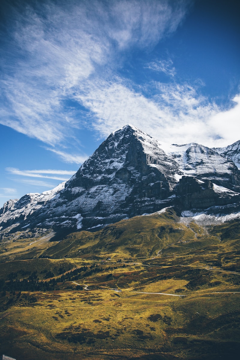 Snow-covered Eiger mountain peak against a clear winter sky