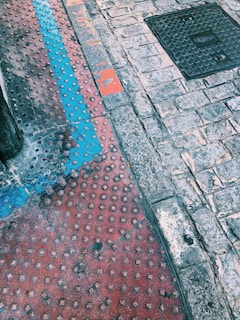 Foot traffic safely navigating a high-traffic loading bay area enhanced with smart grip anti-slip surface.