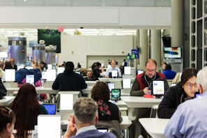 people sitting on an Airport lobby