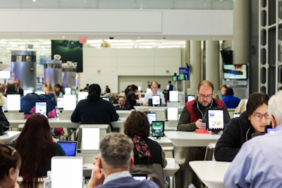 people sitting on an Airport lobby