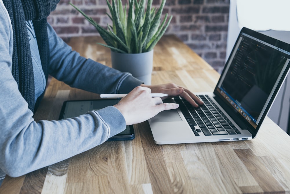 person using laptop