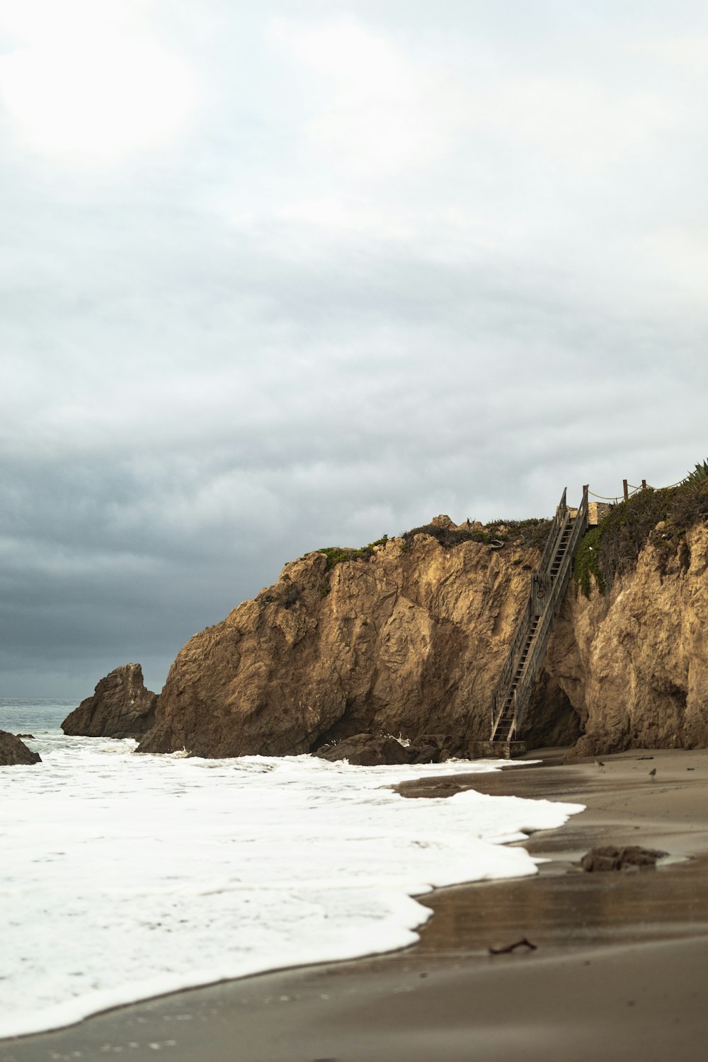 cliff beside shore