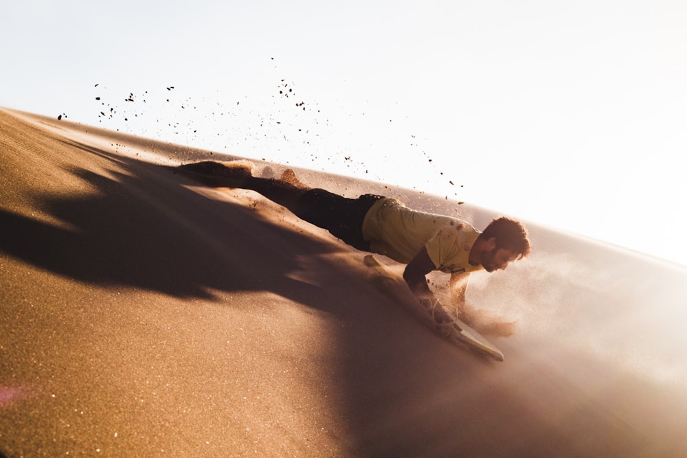 man sliding on deserted place going down