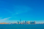 New York City skyline with a focus on legal buildings under a clear sky.