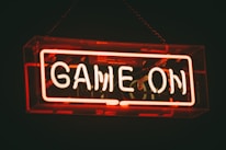 red and white Game On LED signage