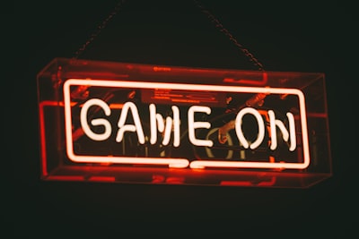 red and white game on led signage neon zoom background