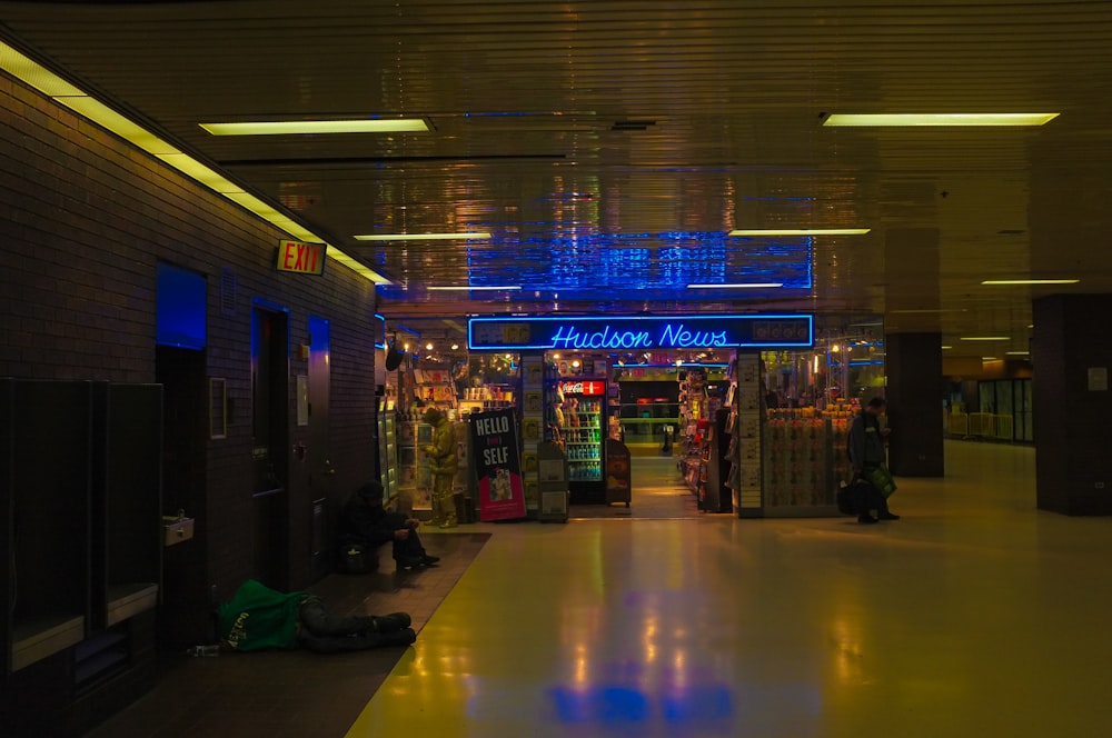 store front with lighted signage