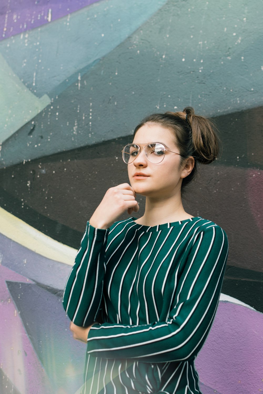 woman in green and white pinstriped dress