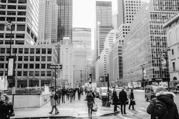 Image of a busy Mumbai street with office buildings in the background.