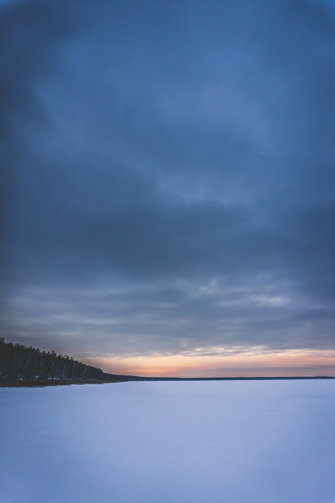 Frozen lake with gray skies