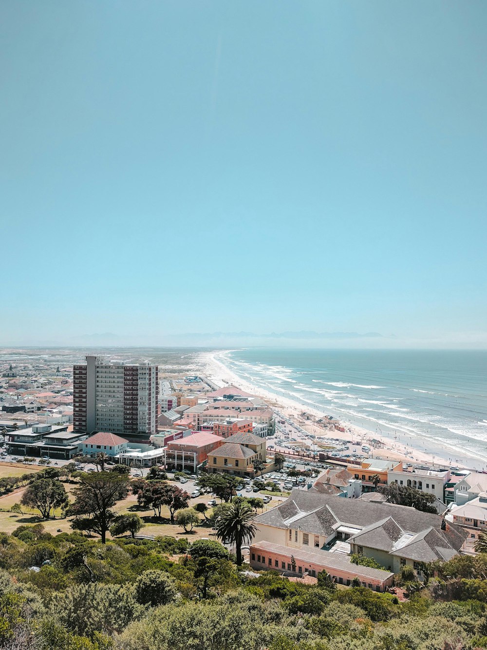 aerial view of houses and buildings at the beach coast