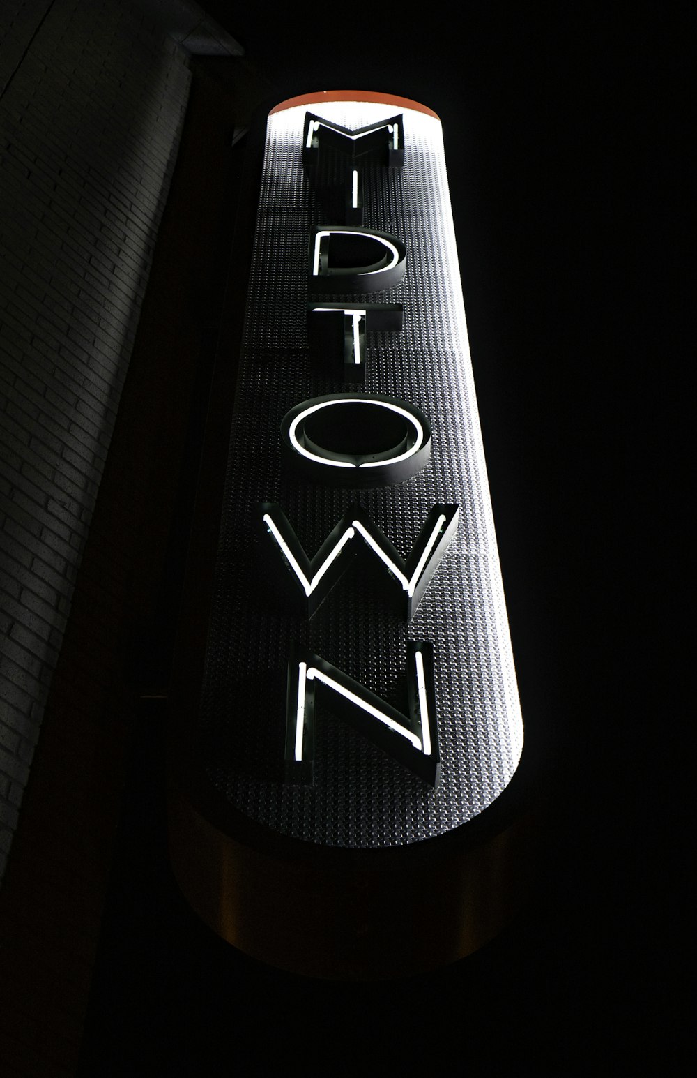 white and grey Midtown neon sign