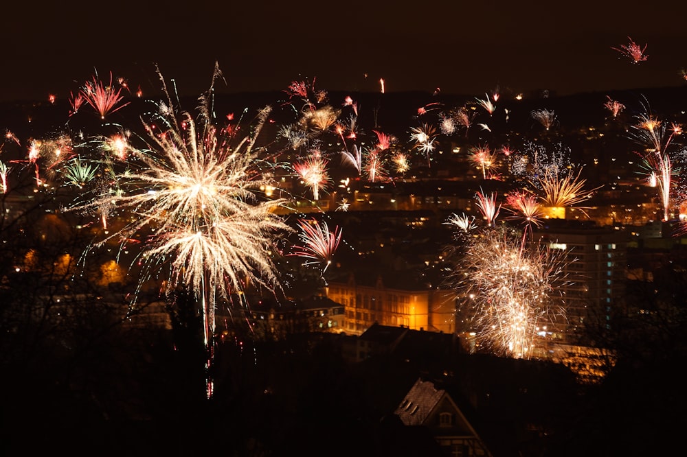 fireworks display over city sky