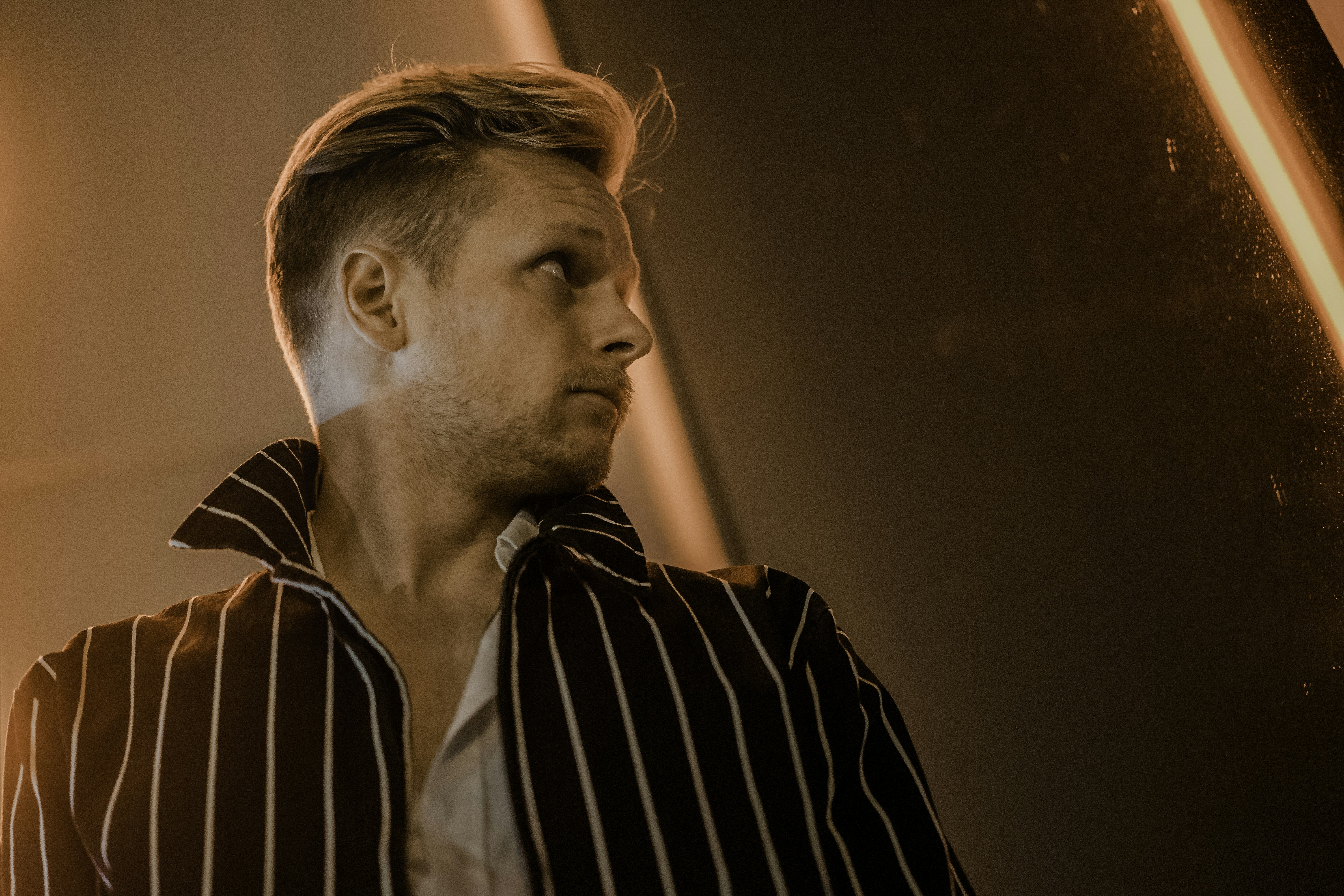 Man Wearing Black And White Striped Collared Shirt Photo Free
