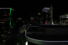 A professional advisor discussing investment plans with a client in a modern Salt Lake City office