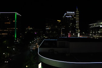 A professional advisor discussing investment plans with a client in a modern Salt Lake City office