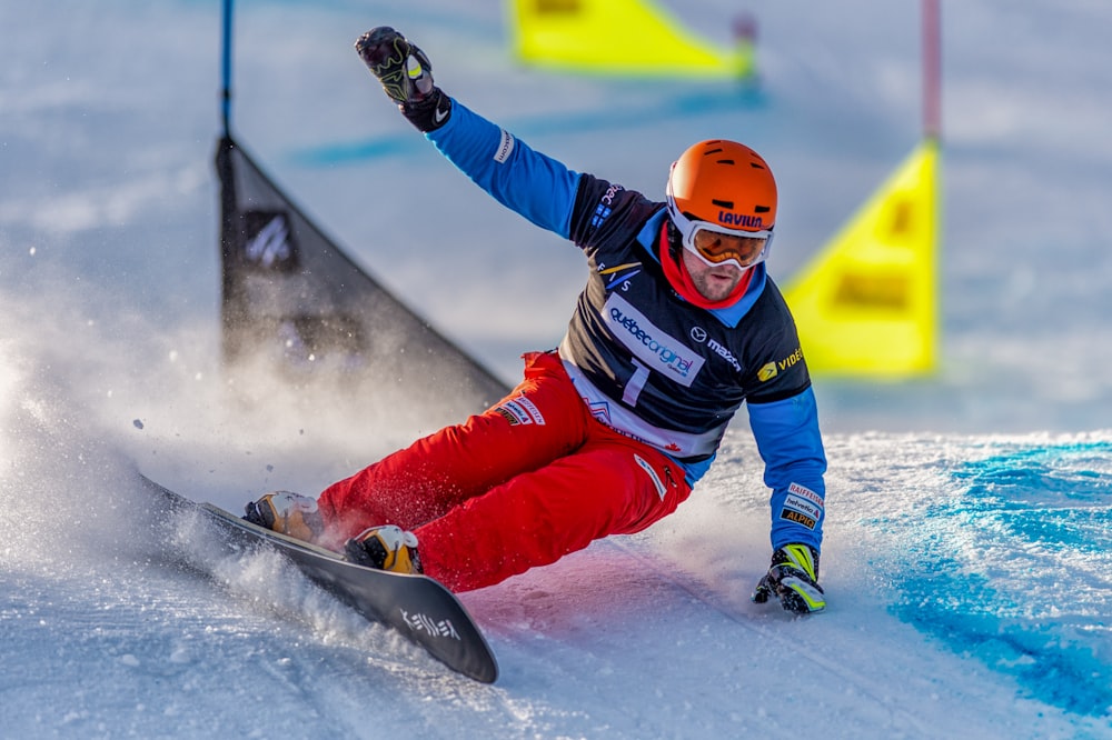 man riding snowboard