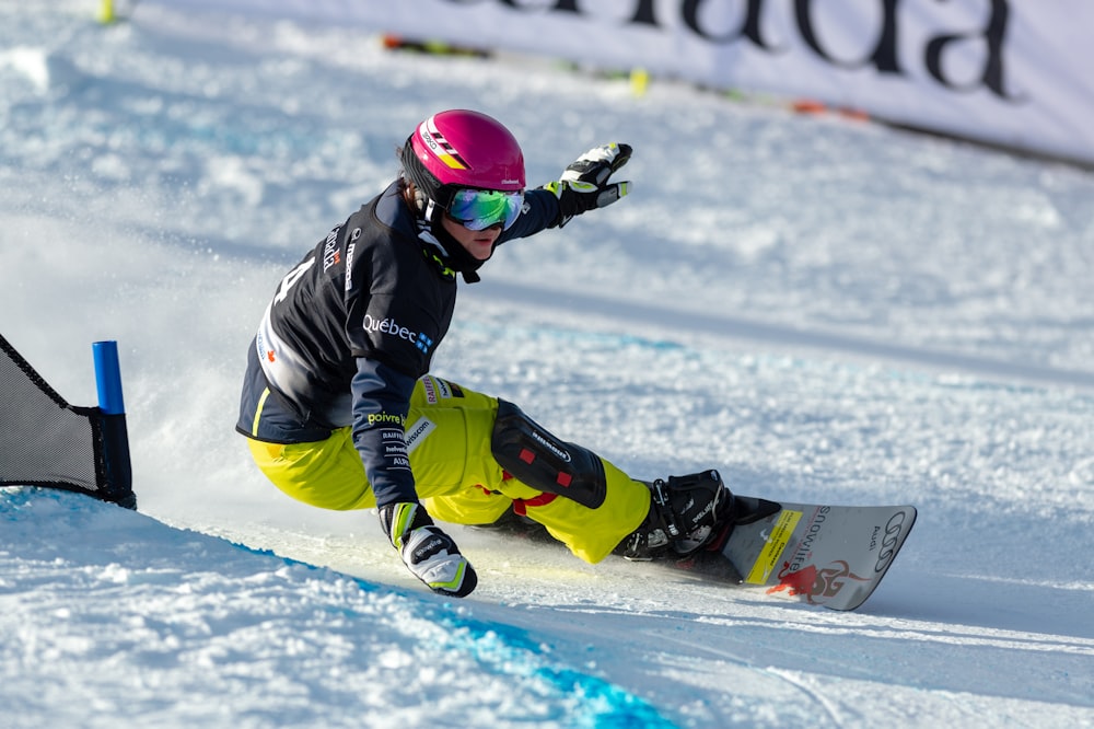 person riding snowboard