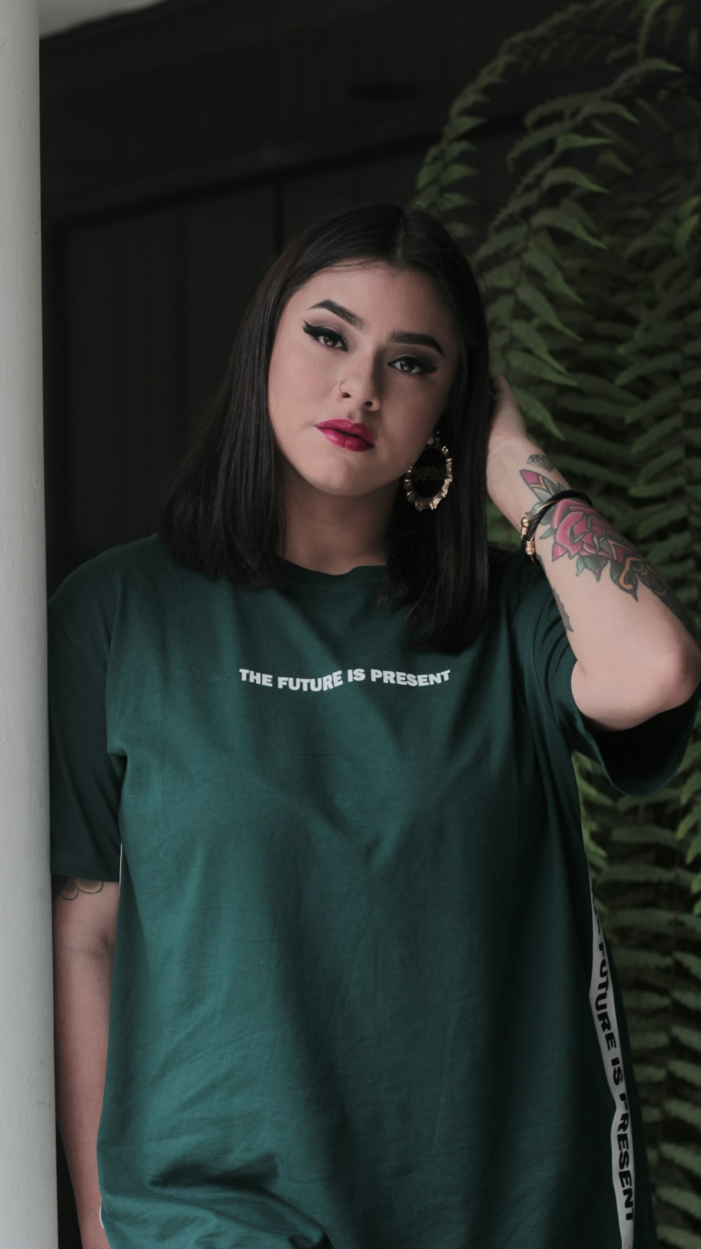 woman with green crew neck t-shirt