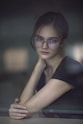 woman holding neck