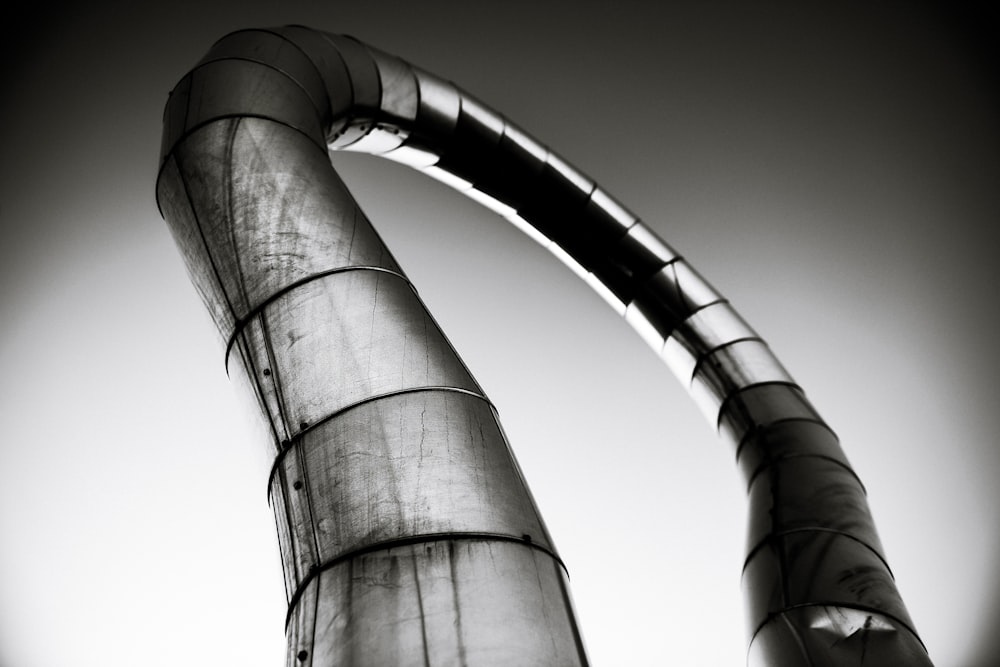 greyscale photo of pipe