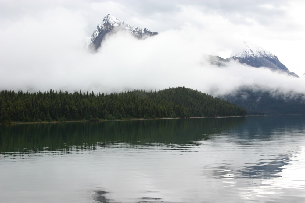 body of water under white sky